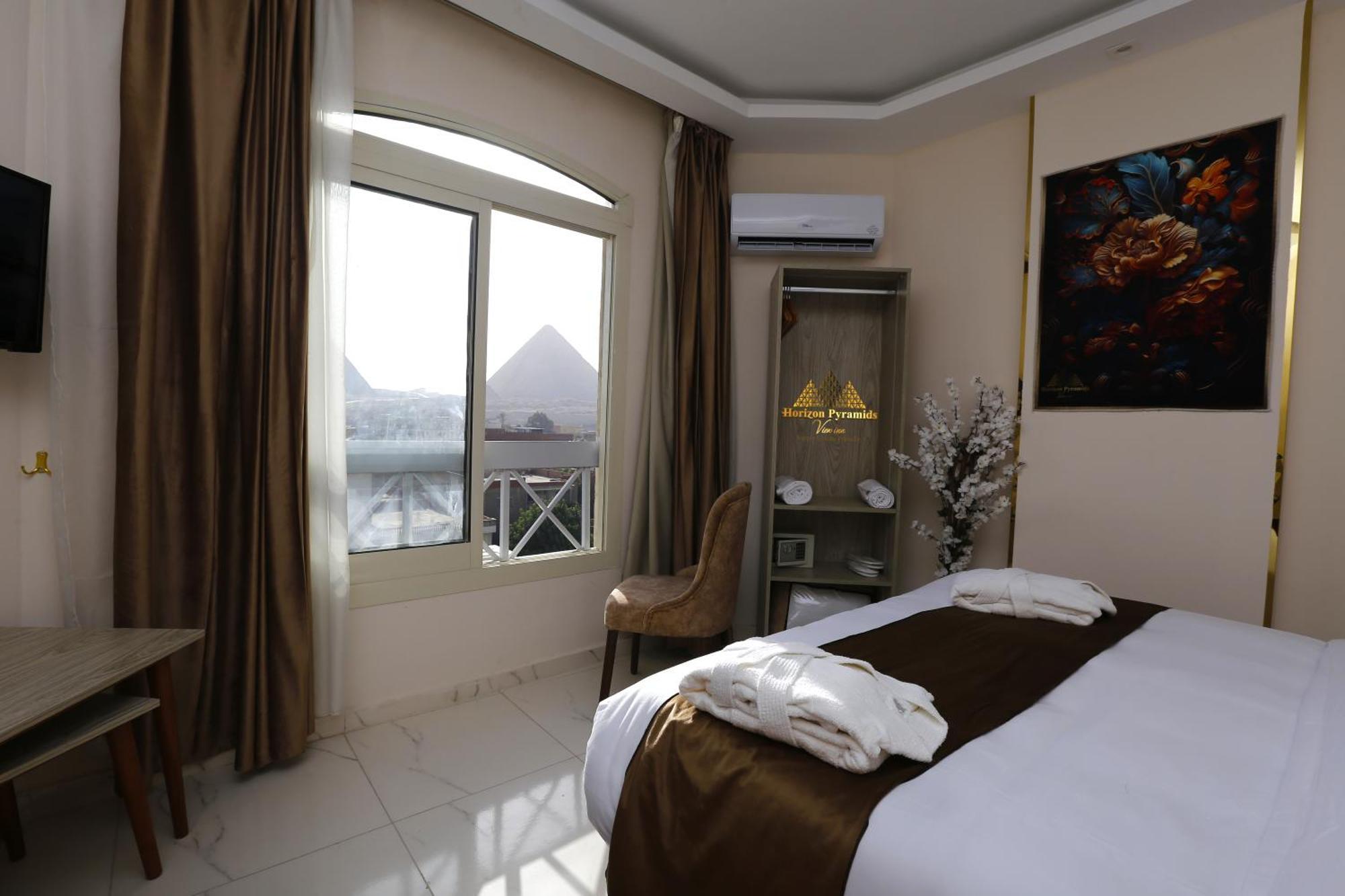 Horizon Pyramids View Inn Kafrat al Jabal Bagian luar foto